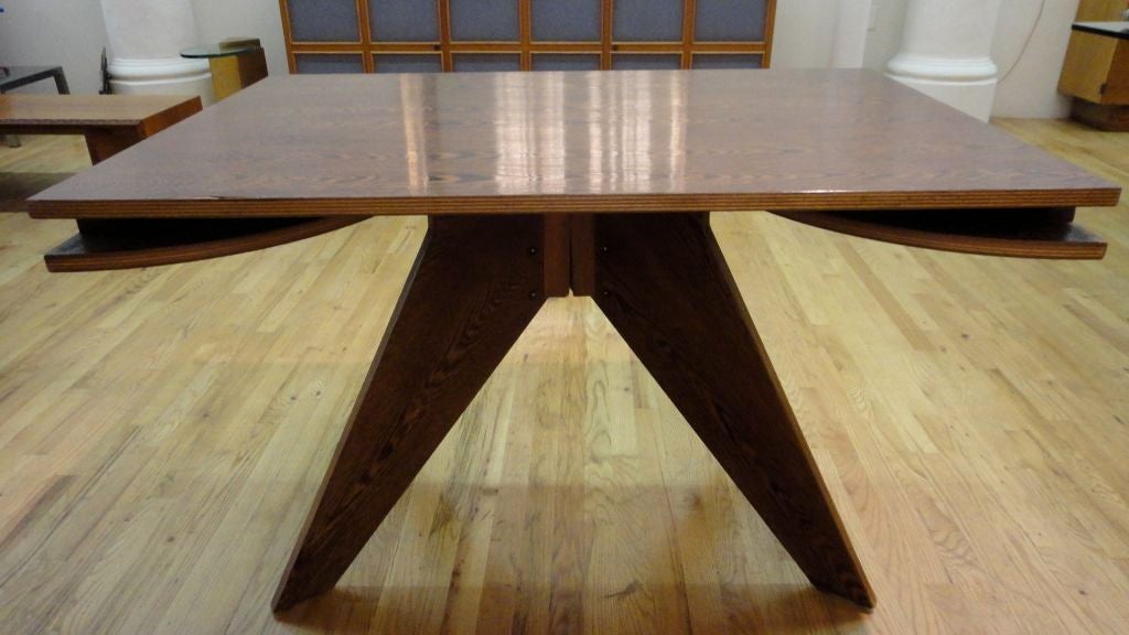 Expandable dining table by Andre Sornay in rare African panga panga wood. Expands to 78 inches in length.