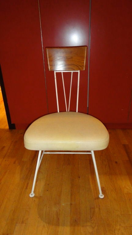 Set of four chairs by Richard McCarthy for Selrite in white enameled metal and wood with a seat in upholstered fabric.