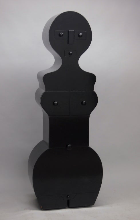 Chest of drawers in black lacquered wood marked #2 in an edition of 8 and signed by Artist Nicola. The cabinet in the shape of a body has drawers for eyes nose mouth and 5 more lower body all with black lacquered pulls. The torso two drawer share a