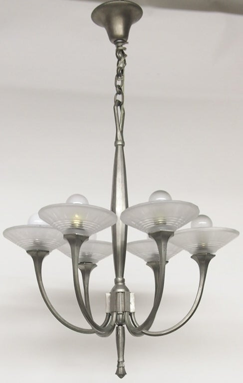 Ceiling fixture in nicely formed nickel with six arms that support handblown glass shades all from the Art Deco period and in excellent vintage condition. There are no chips to any of the glass and no dents in the metal.