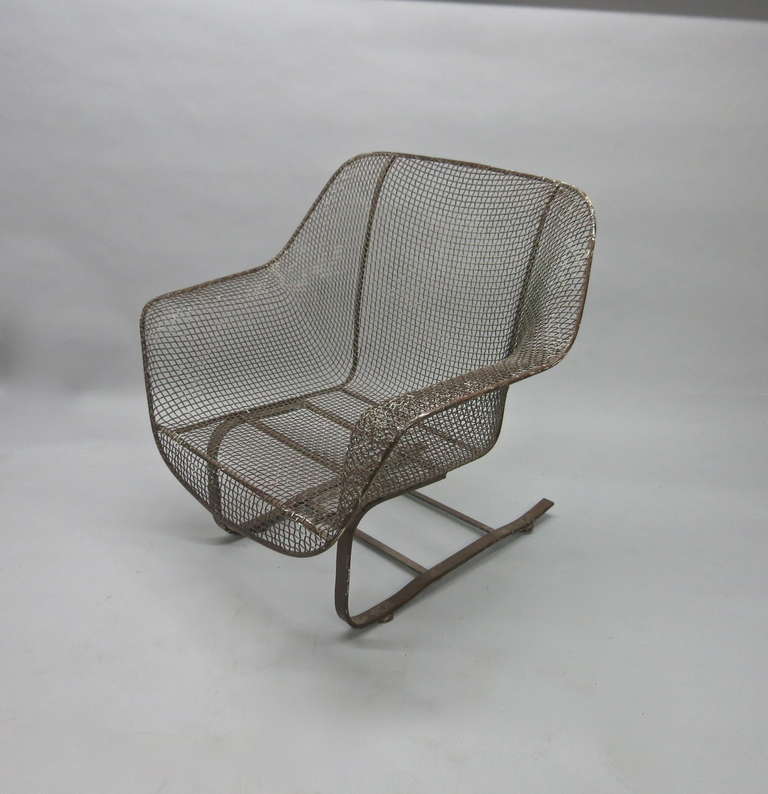 Outdoor Garden chair by Russell Woodard with original patina can be painted in any color. Chair has no breaks in welds and is in great structural condition with original finish