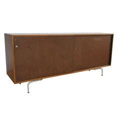 Vintage Walnut Credenza with Pegboard Sliding Doors by Maurice Martine
