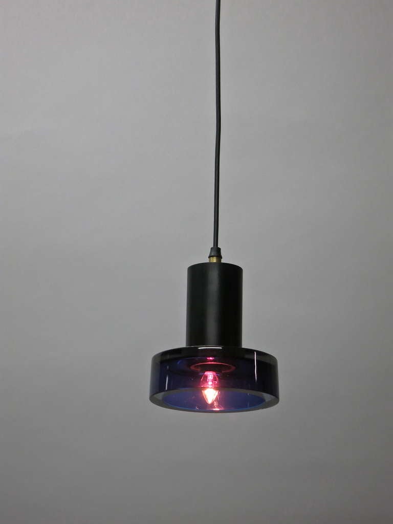 Five ceiling lights in colored supported by a metal cylinder that hides the wiring that can hang at any height. A specified, finished height will be completed prior to delivery at no charge.