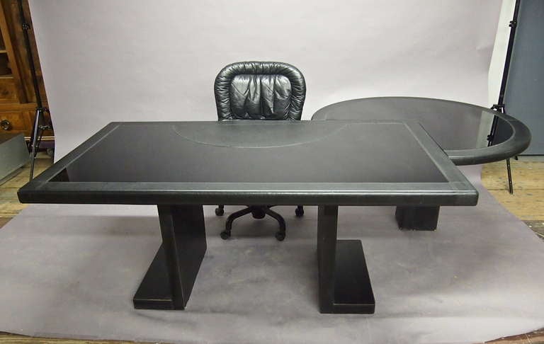 Desk by Pace in leather with a black glass top, a demi lune leather blotter, and a versatile semi-round computer/side table.The table can attach on any side. Chair no longer available.