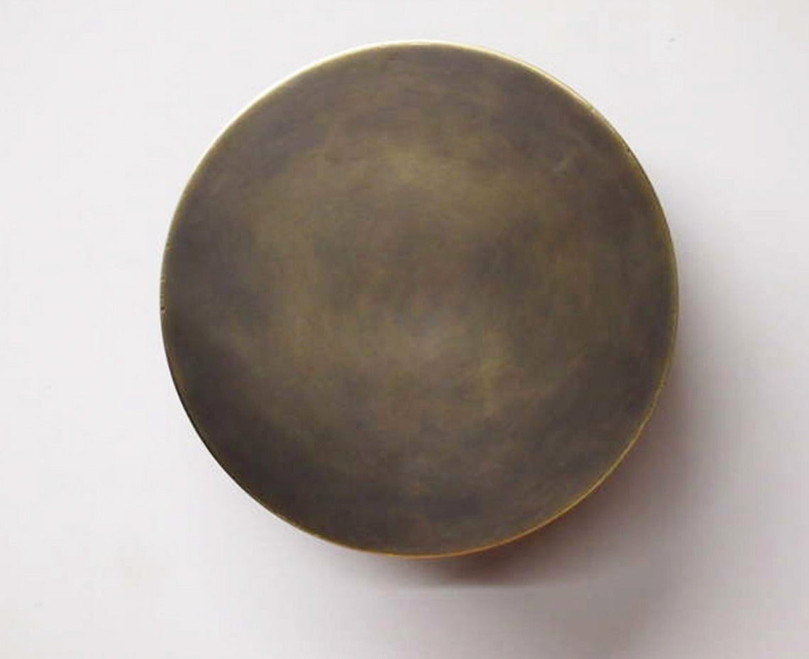 Round ceiling or wall-mounted lights in patinated brass with a cylindrical stem and round mounting plate enameled in white. Each light has three, American standard, porcelain sockets.
