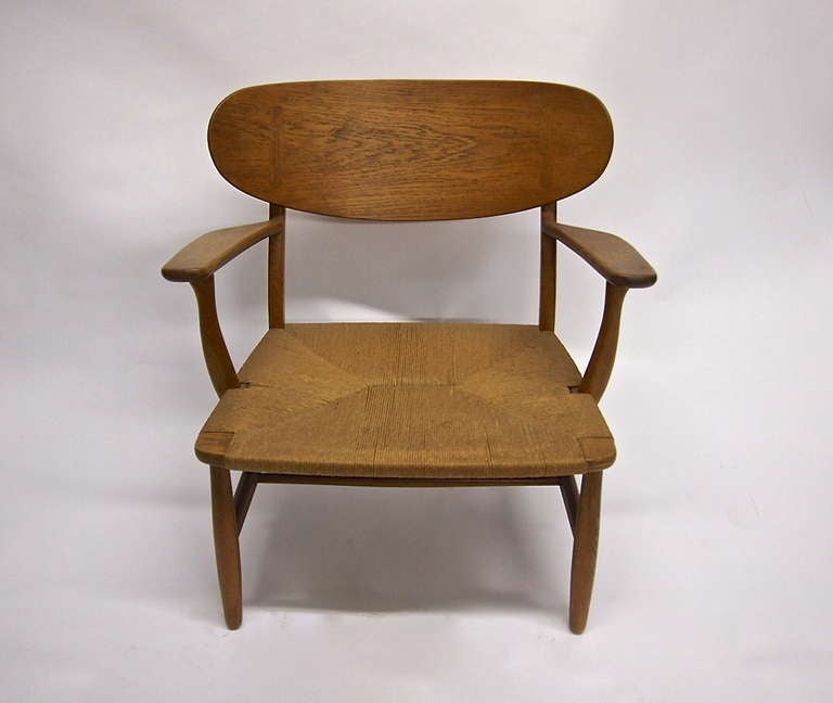 CH-22 chair with a roped seat in very good vintage condition. Chair was purchased in 1954 shortly after it went into production and is in original condition seat has no damage and is impressed 