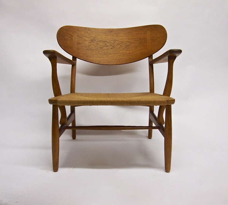 Mid-Century Modern CH-22 Chair by Hans Wegner signed Carl Hansen & Sons Made in Denmark 1954