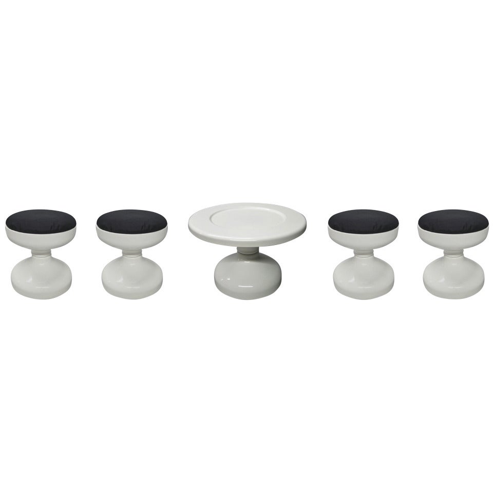 Four Rochetto Stools and Table Designed in 1960 by Castiglioni for Kartell Italy