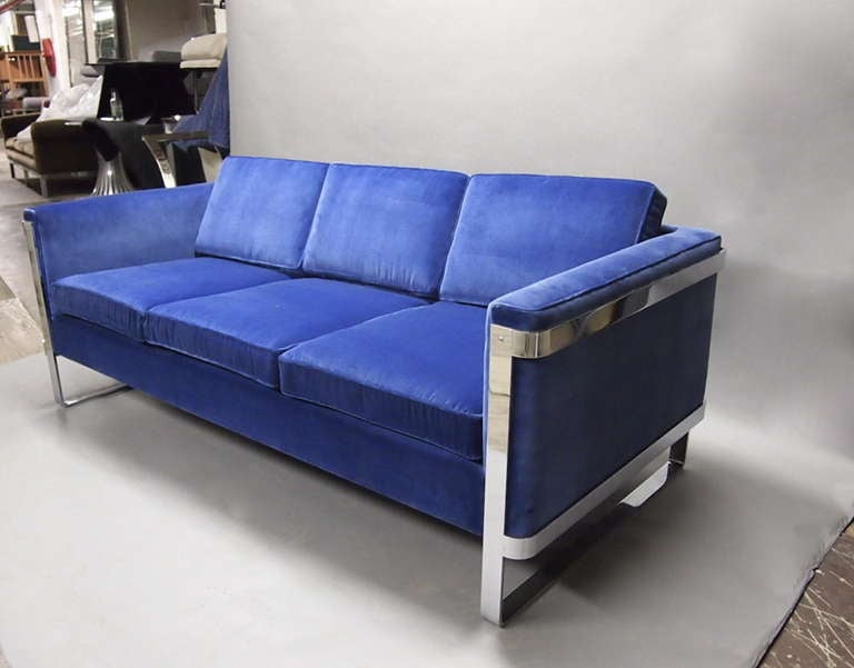 Sofa in Polished steel and newly upholstered in blue velvet