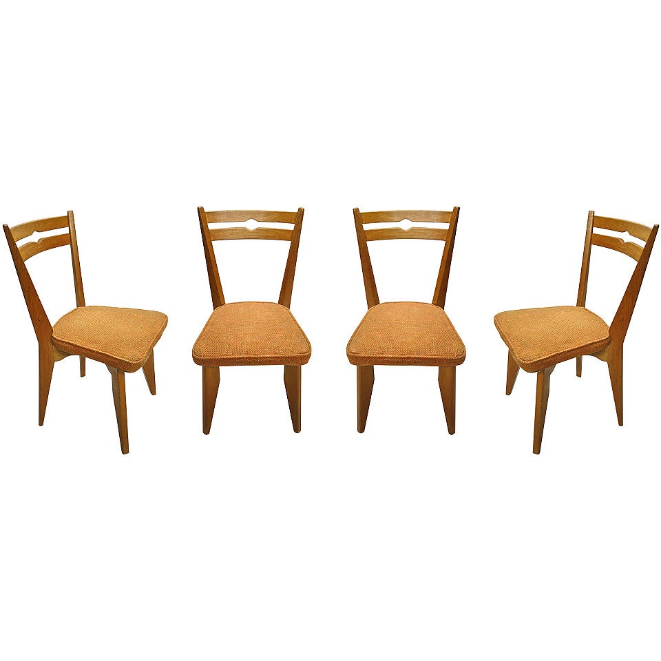 Set of Four French Dining Chairs by Guillerme et Chambron in Oak, circa 1950