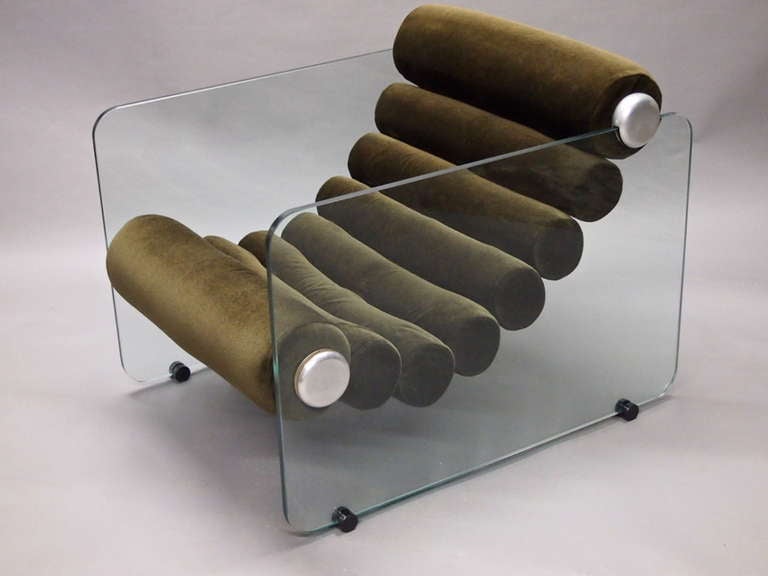 Hyaline Chair designed by Fabio Lenci for Stendig in 1967 made of Tempered glass on each side that is held together by the cushion, eight continuous brown fabric bolsters, that mounts to the glass on  bottom and top.