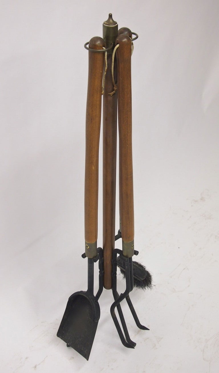Two sets of functional and strong fire tools. The quality, craftsmanship and the design are all there. The stand is sturdy and well balanced. Tools and stand are made of walnut and wrought with patinated brass detailing. I will sell them separately.