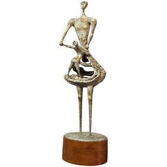 Bronze Abstract Sculpture with wood pedestal signed M.Ubaldi
88