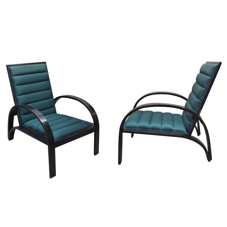 *SUMMER SALE*
Pair of Ward Bennett for Brickel lounge chairs in ebonized ash wood, arched arms/legs, an adjustable back, and upholstered in a dark teal fabric. 