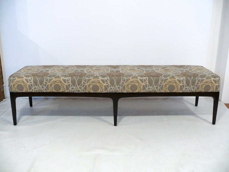 Six leg walnut bench finished in a deep espresso upholstered in Crypton fabric.  Two rows of buttons along the top give extra punctuation to this bench.

Please visit Fairfield County's largest freestanding destination for Mid-Century Modern