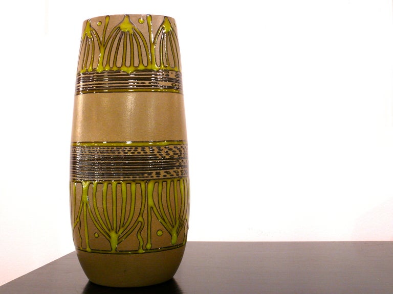 Incredible vase by renowned artist Sascha Brastoff.  This vase is in tones of green and brown with an art nouveau influence.  <br />
<br />
