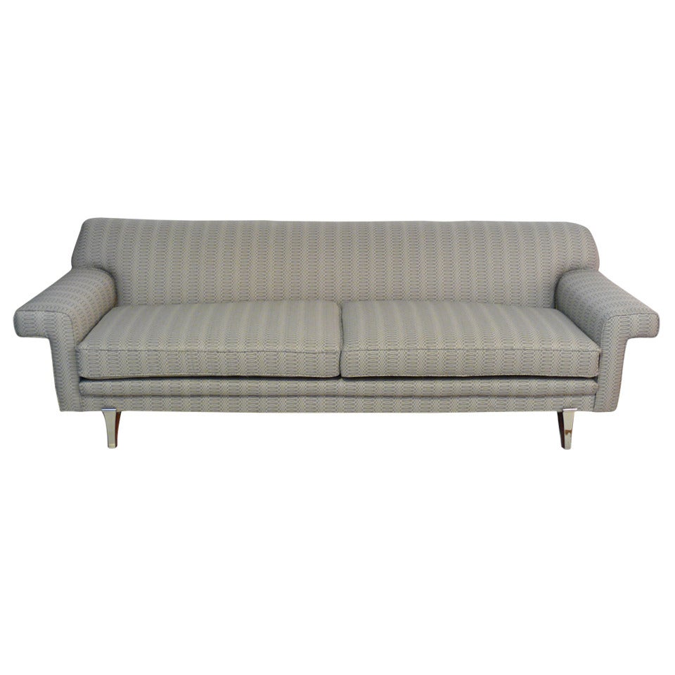 Streamlined Sofa with Nickel Leg Appliques