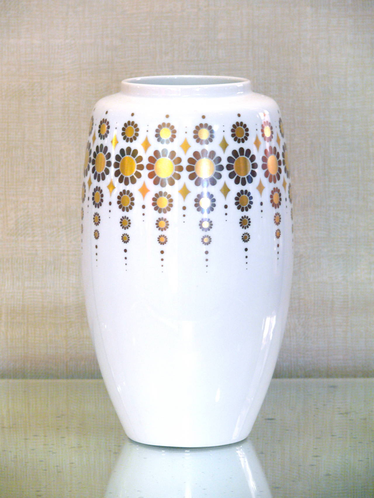 Gorgeous porcelain vase by Alboth & Kaiser with rich golden and brown floral 'JUWEL' decor on a beautiful white glaze. Made in Germany.