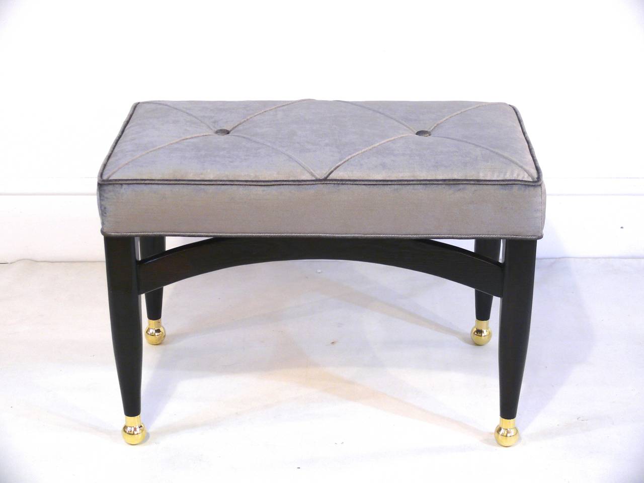 Pair of sculptural benches in the manner of Gio Ponti with blown round brass sabots. Finished in a deep espresso with pewter velvet upholstery.  