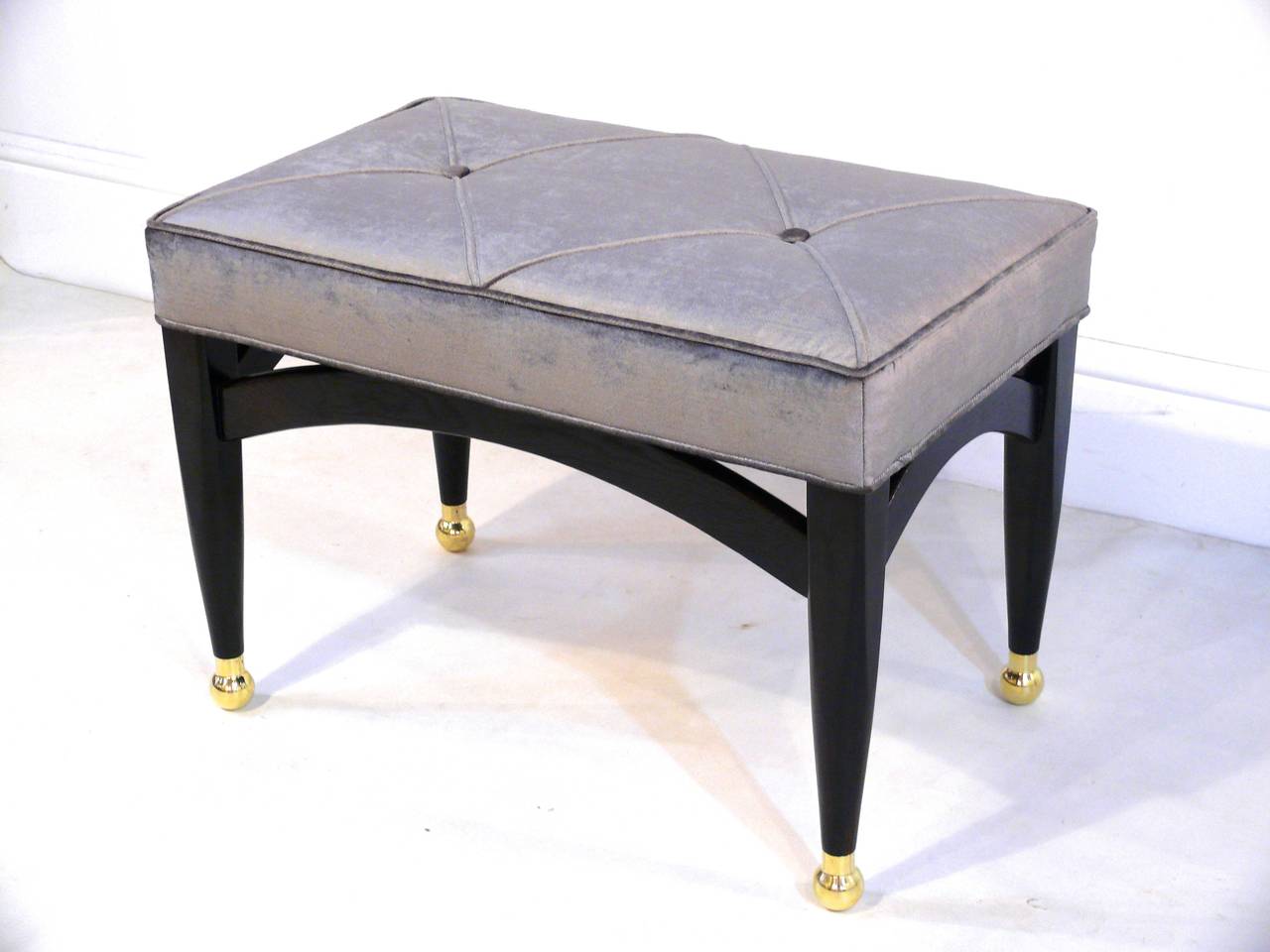 Mid-Century Modern Pair of Sculptural Ebonized Ottomans