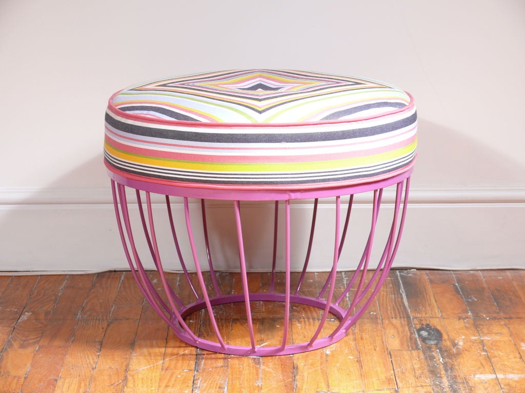 FINAL SALE! NO HOLDS OR APPROVALS.  SALE ENDS FRIDAY FEBRUARY 10TH AFTER WHICH THIS ITEM WILL RETURN TO ITS ORIGINAL PRICE!
This amazing fuchsia powder coated iron  Mid Century ottoman has been newly upholstered in spectacular Sunbrella fabric in a