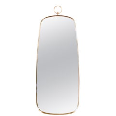 ON HOLD: Elegant Brass Framed Mirror in the Manner of Fornasetti