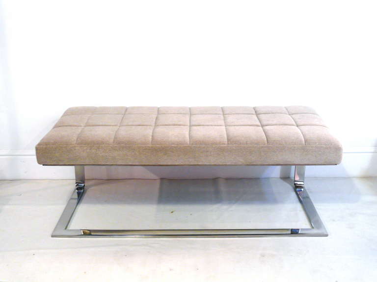 Pair of 1970's cantilevered chrome plated steel benches with tufted tops in the manner of Milo Baughman. The chrome is highly polished and tops newly upholstered in a neutral cotton velvet.