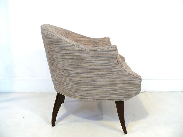 Pair of Italian sculptural chairs in the manner of Gio Ponti. Newly refinished and recovered in a Knoll fabric.