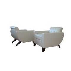 A Pair of Club Chairs in the manner of Jacques Emile Ruhlmann