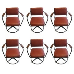 A Set of Six Armchairs in the style of Jean Prouve