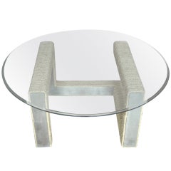 An unusual rope wrapped metal table base and glass top