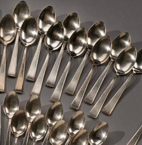 Mid-20th Century 100 Piece Hammered Silverware Service For Sale