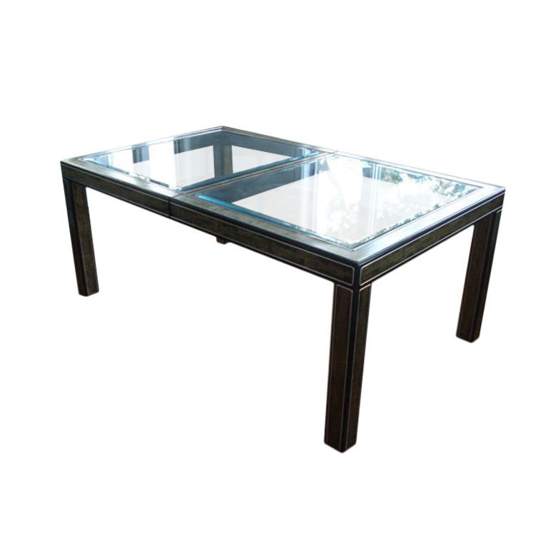 Extension dining table in metal with glass top and three glass inserts. Designed by Bernard Rohne, made by Mastercraft.

Table dimensions:
Length 74