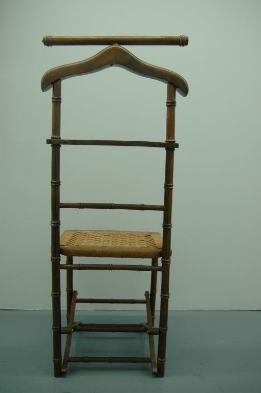 An Italian Faux Bamboo and Rope Valet Chair 1