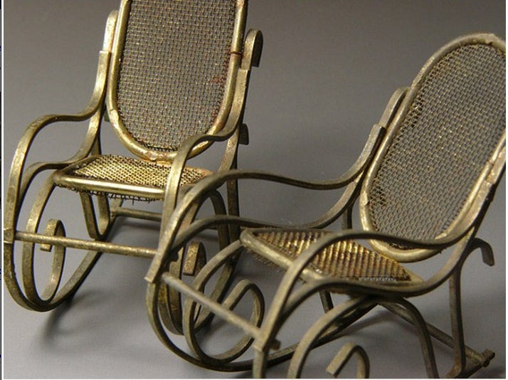 An unusual and rare pair of miniature Thonet rocking chairs in bronze. Chinese in origin, and dating from the turn of the 20th century.

Perhaps originally intended as doll furniture, a manufacturer's sample, or simply the whimsical creation of a