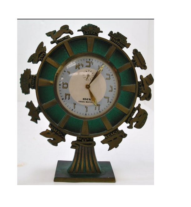 An IDOX (The Israel Watch Co) desk clock, the dial labeled in English and with numbers in Hebrew characters.