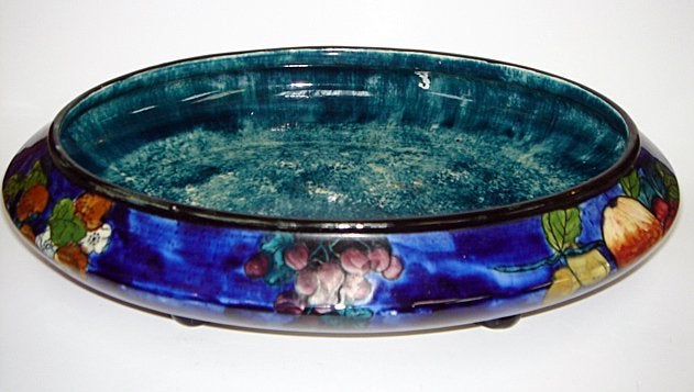 A superb Titian ware bowl by Hancock and hand painted by F.X. Abraham, and signed by the artist; F.X Abraham was art director of the Sampson Hancock factory in the 1920's. This bowl dates to that period. A magnificent piece which would show well in