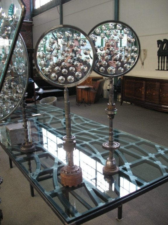 Feliciano Bejar (Mexico, 1920-2007)

Each Magiscope made with cut and mirrored glass, reclaimed steel and various automotive parts. Both signed and dated by Feliciano Bejar; 
Taller: 39 3/4