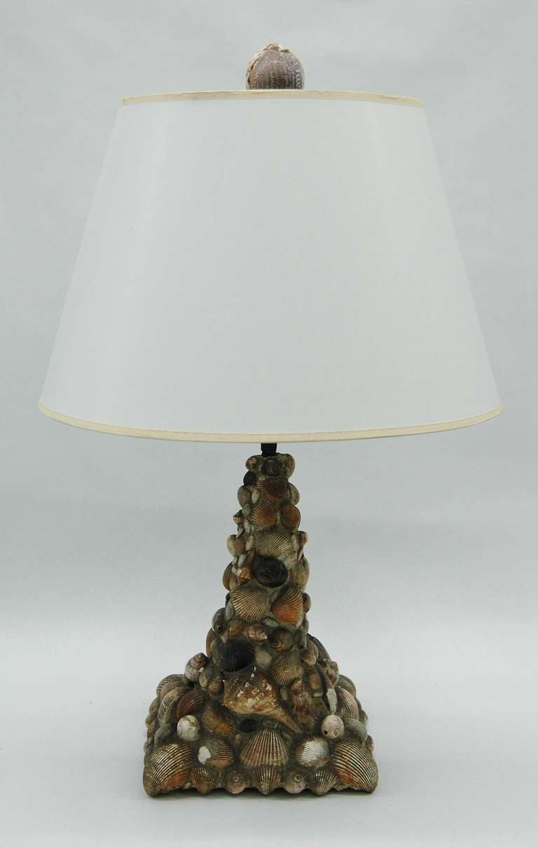 Beautifully crafted shell table lamp with a masculine Adirondack form and construction.