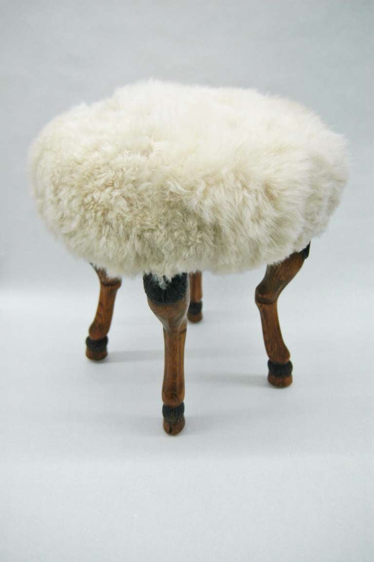 Georgian A Pair of Shearling Upholstered Stools with Hoof Feet