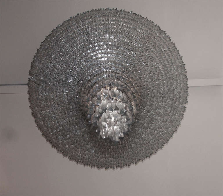 A grand 1960's Venini chandelier consisting of 6 tiers of layered murano glass crystals.