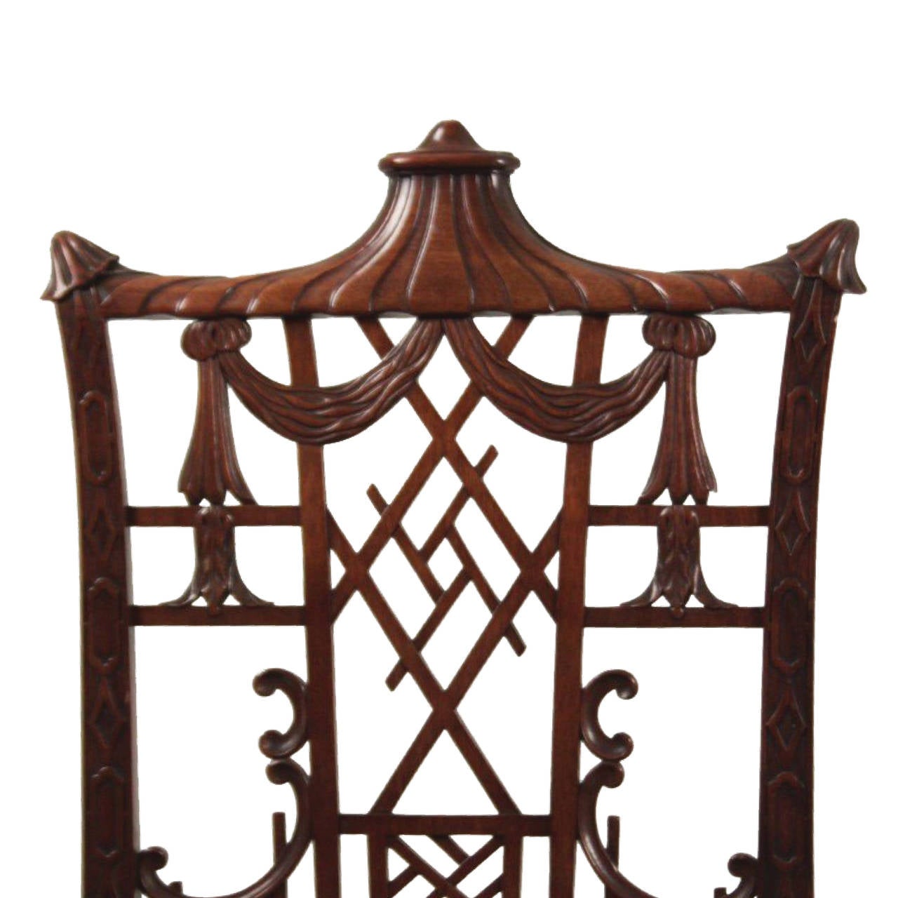 Two Chinese Chippendale chairs in mahogany with a carved backrest and pierced under-stretchers.