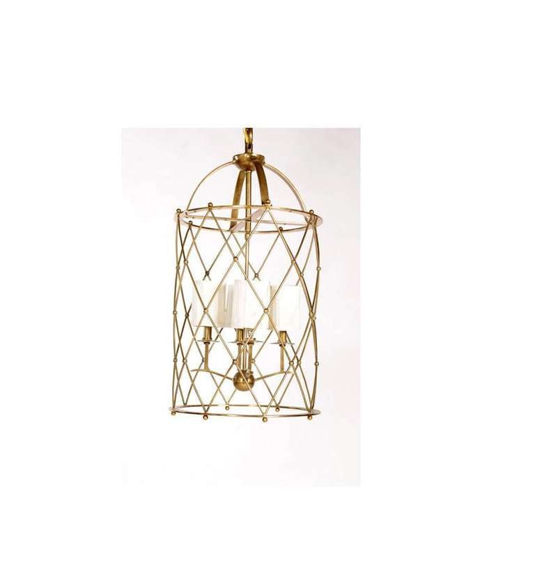 A basket weave brass lantern in the style of Jean Royere. The basket weave as well as the small metal spheres are design concepts heavily used in Royère's furniture.