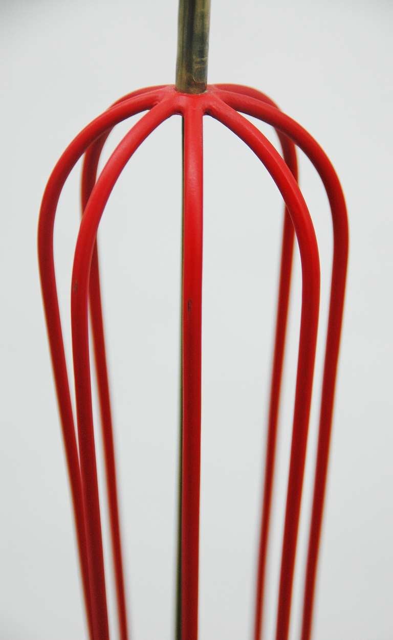 Mid-Century Modern A Red Metal Floor Lamp In The Manner Of Jean Royere