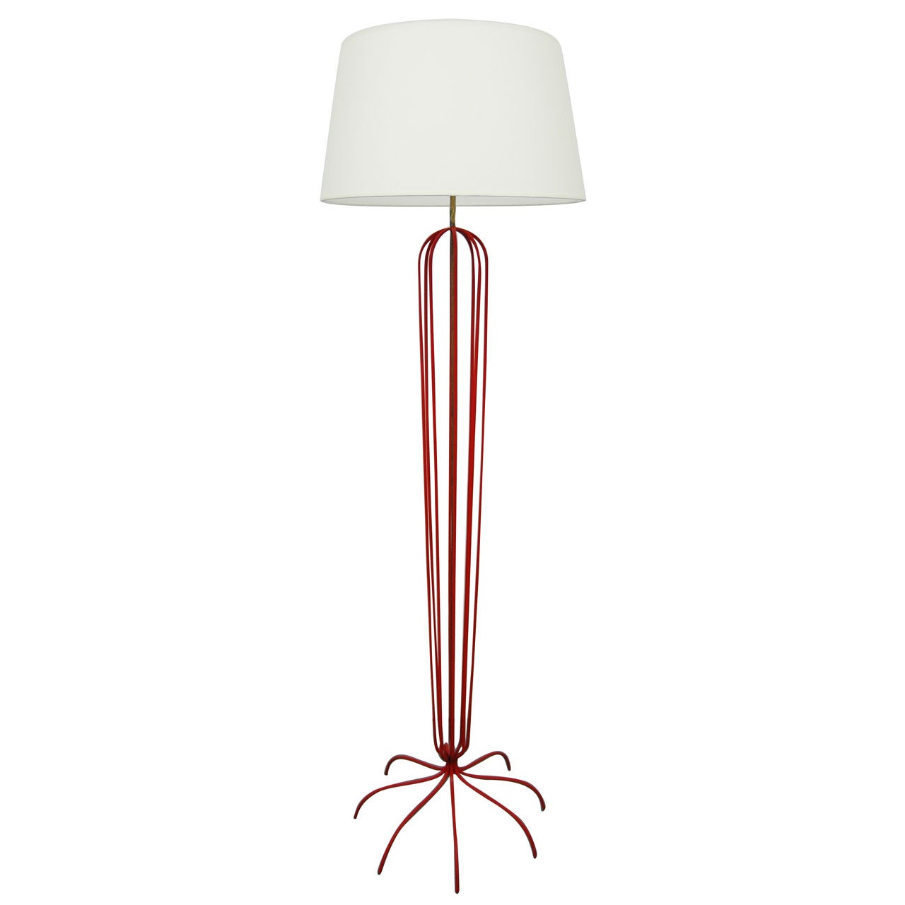 A Red Metal Floor Lamp In The Manner Of Jean Royere