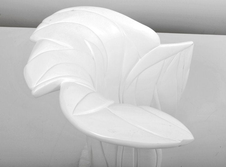 A curvaceous (dare we say voluptuous?) solid white two-section dining table base by Ron Seff. United States, circa 1980.

Inspired by Hollywood Regency designs of the likes of Dorothy Draper and French designer Serge Roche's very similar