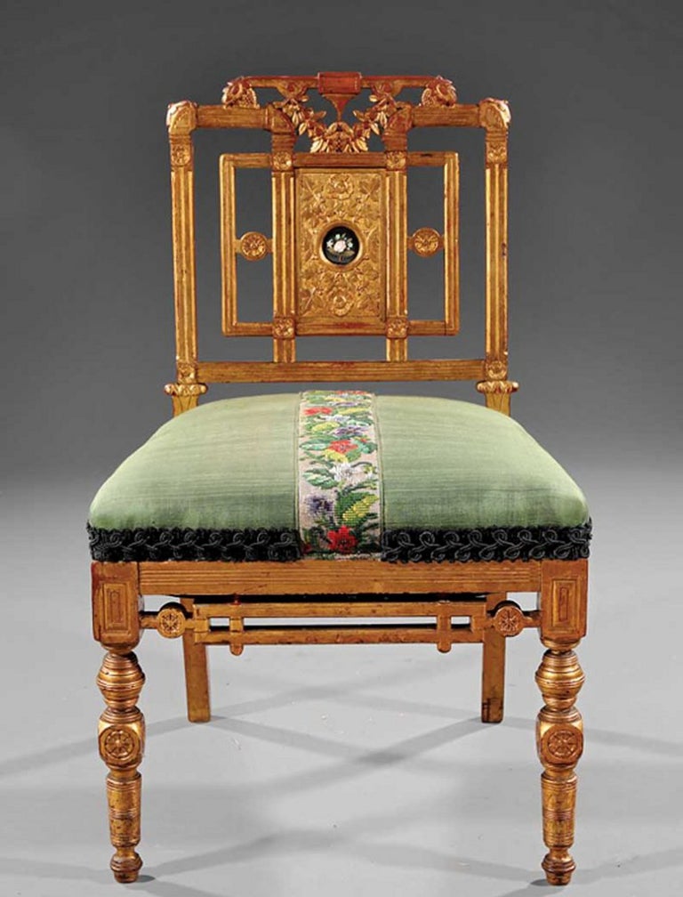 An interesting American side or slipper chair in giltwood with inset central medallion on splat. 

The design with a neoclassical Revival vocabulary but a distinctly Aesthetic Movement feel to the lines. 

Retaining old, possibly original