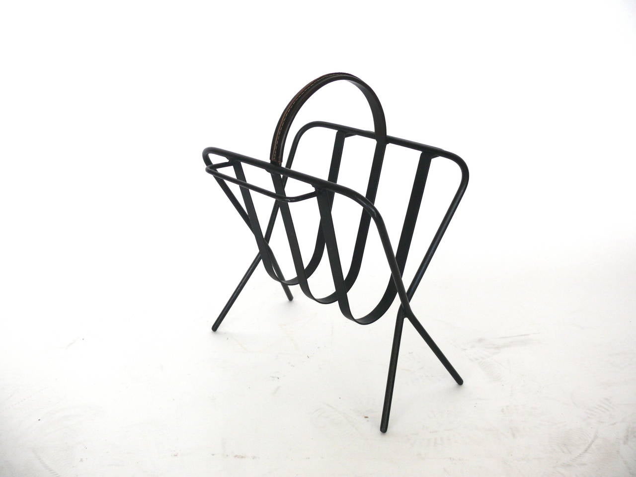 Mid-20th Century Iron and Leather Magazine Rack by Jacques Adnet