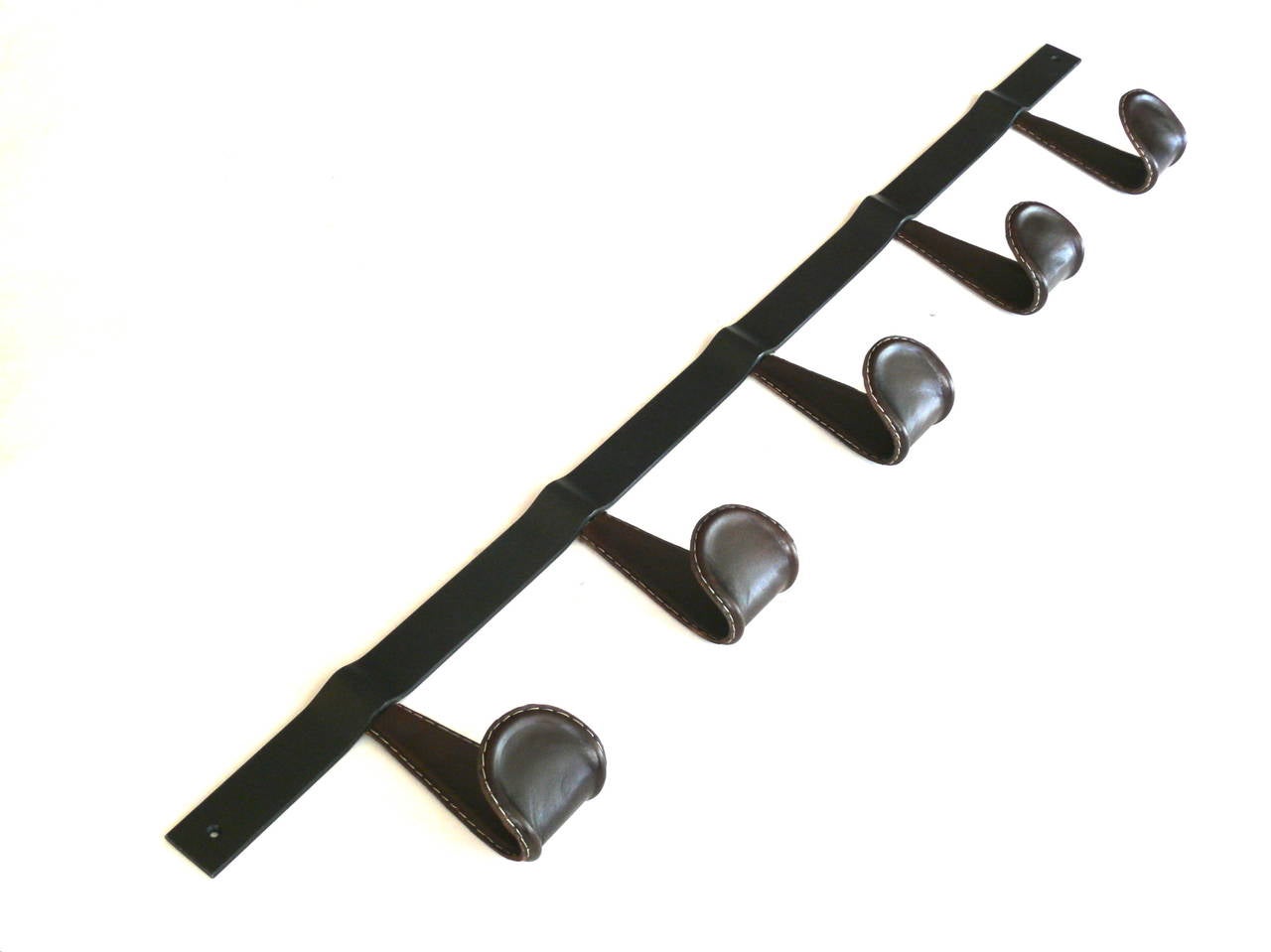 Newly produced iron and leather coat rack. Iron hooks wrapped in chocolate brown leather with contrast stitching. Leather options available.