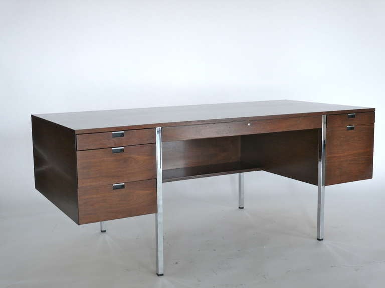 Impressive large rosewood desk by Roger Sprunger for Dunbar. Desk floats on chrome legs with chrome detail throughout. Original finish. Pencil and storage drawers provides wonderful practicality. Stunning piece! Matching credenza sold separately. 
